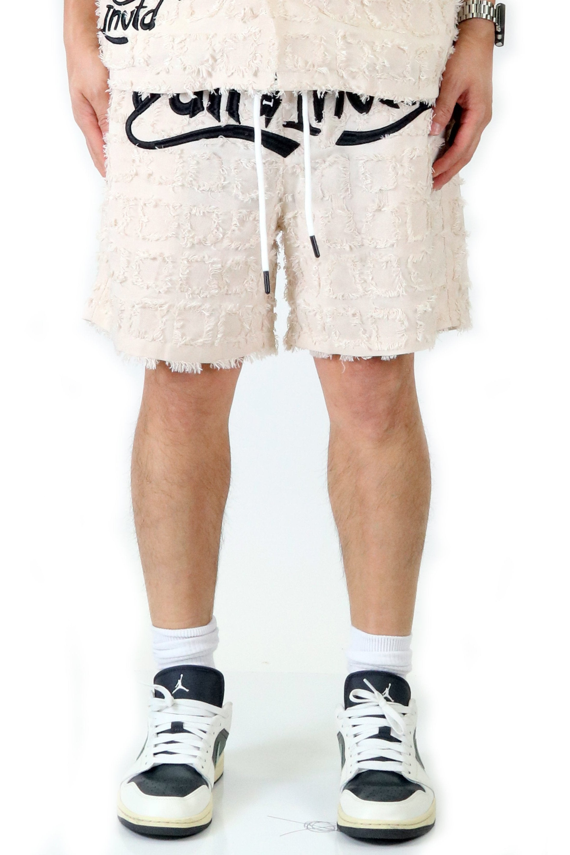 Earth Men's ripped & repaired short pants
