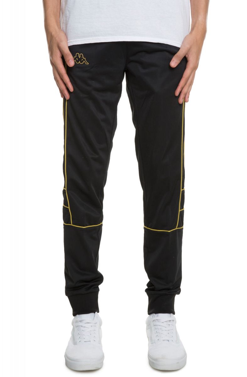 white and gold kappa pants