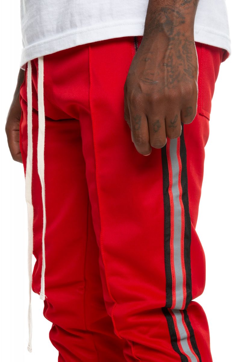 nike track pants red stripe