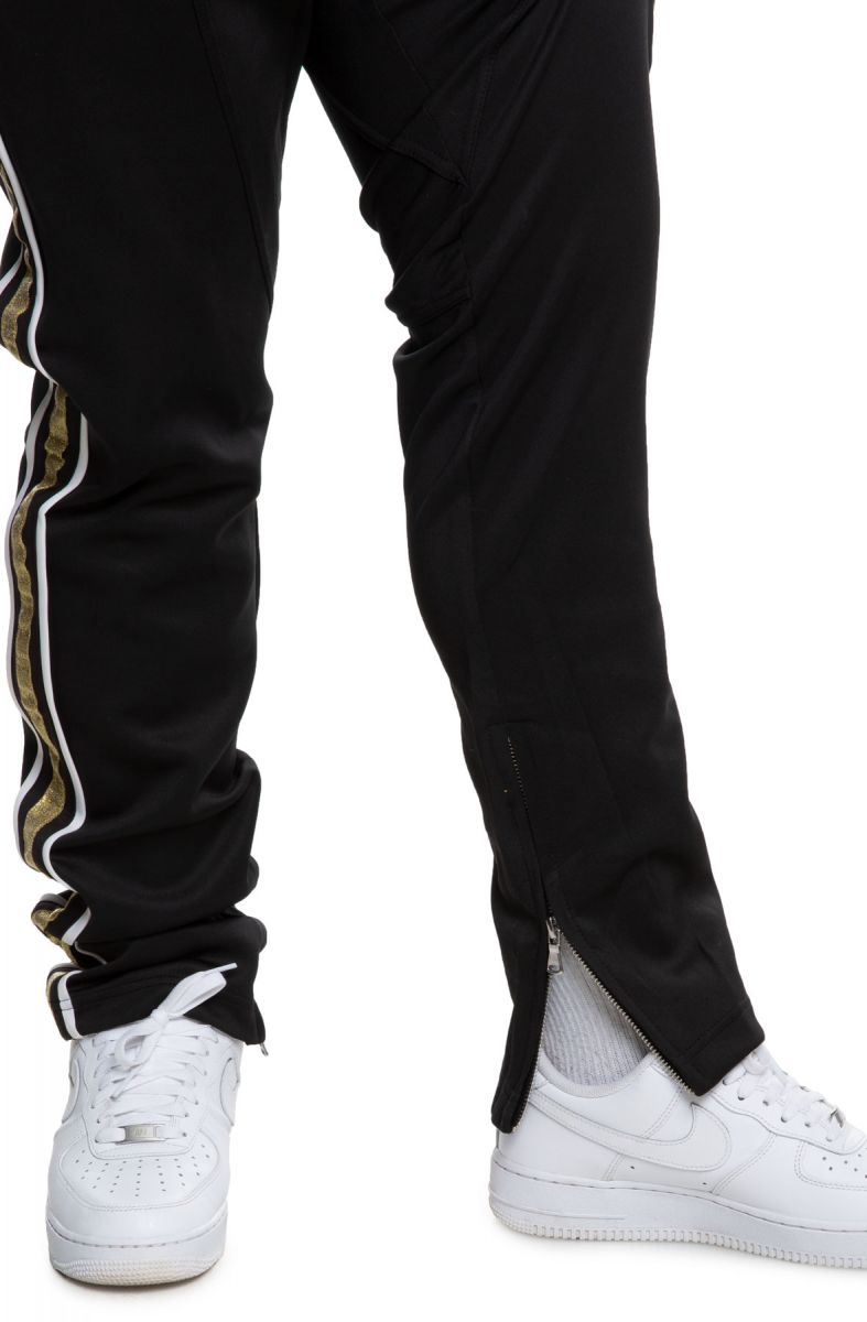 track pants black and yellow