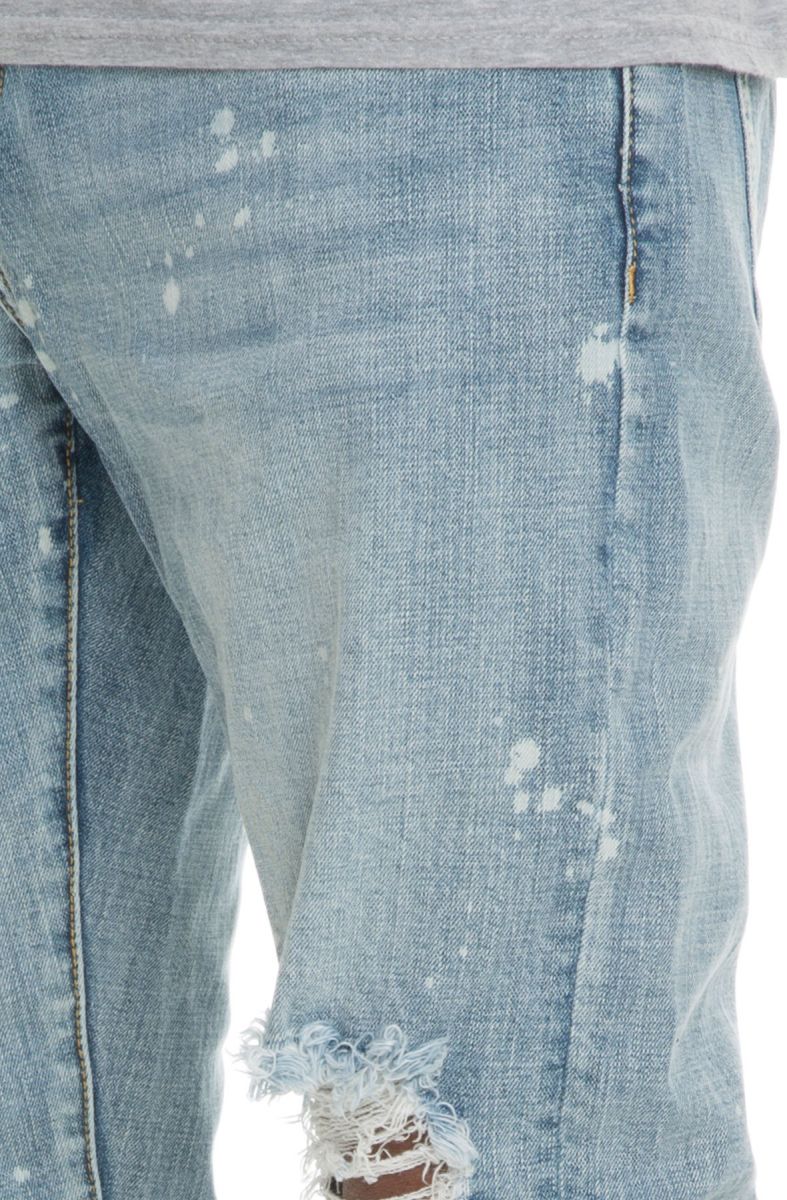 EMBELLISH The Bullet Exposed Ripped Bleach Splatter Denim Jeans in Blue