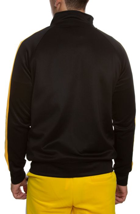 black adidas jacket with yellow stripes