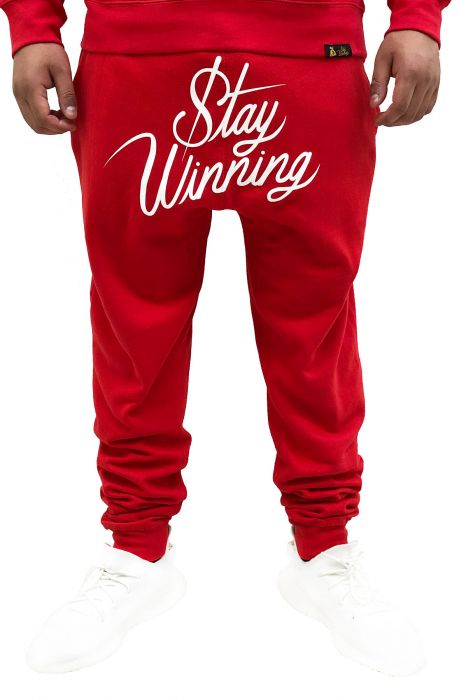 red joggers with white stripe