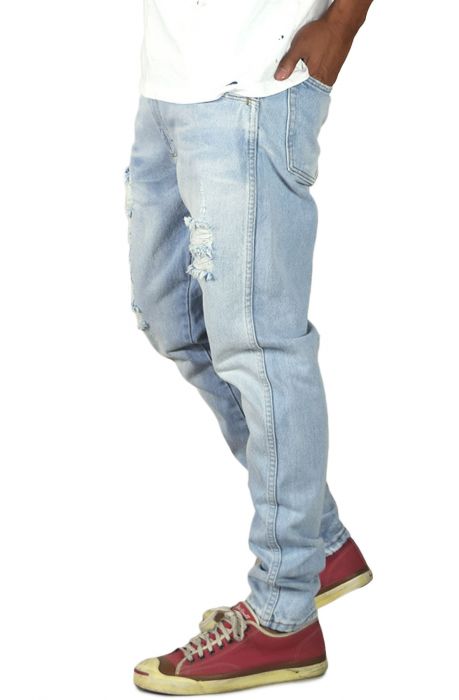 The Light Stonewashed Ripped Tapered Denim Jeans in Light Blue