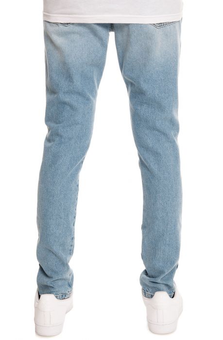 ENSLAVED The Tapered Ripped Denim Jeans in Faded Indigo 1TAP100-FIN ...