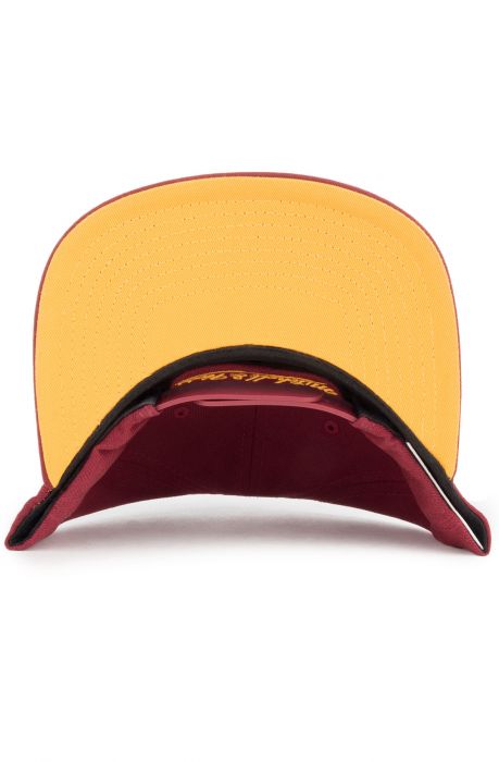 The Cleveland Cavaliers Tonal N Gold Snapback in Burgundy