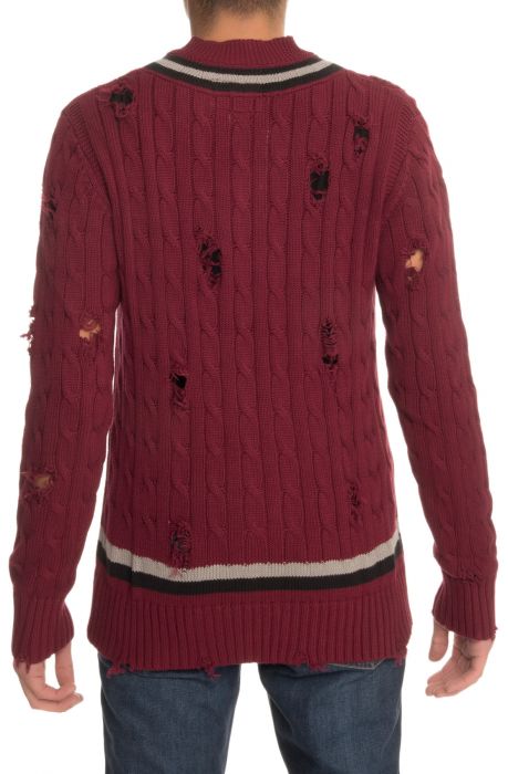 The Distressed Cable Knit Sweater in Burgundy