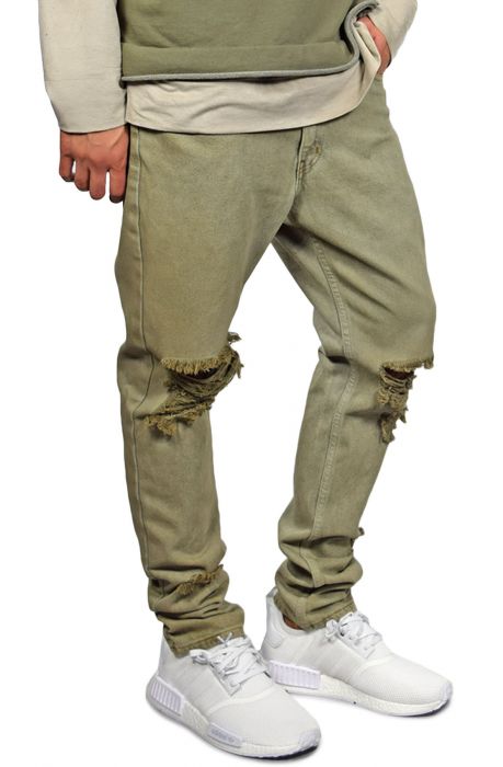 The Bleached Ripped Tapered Denim in Olive