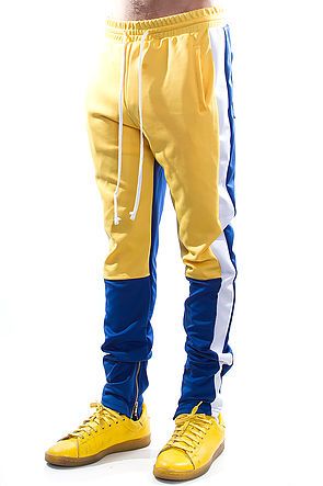 yellow track pants with white stripe