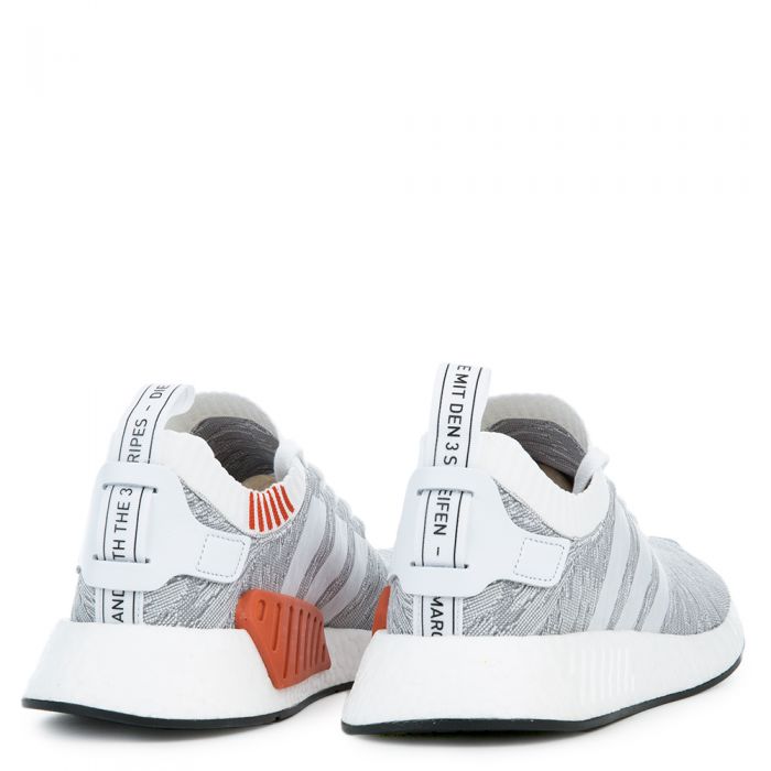 The NMD_R2 PK in White and Coral Black