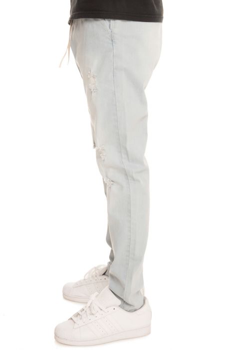 The Distressed Denim Joggers in Bleached Stone Washed Blue Light Blue Stone