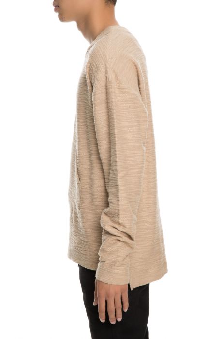The Keyon Bib Collar Steppe Hem Sweater in Marled Tan