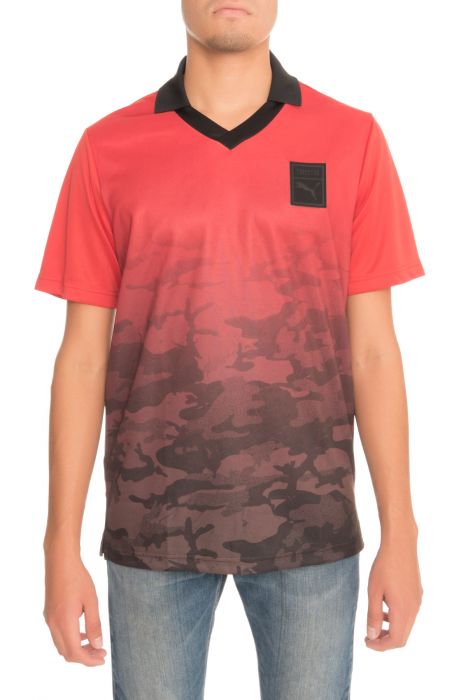 The Puma x Trapstar Football Tee in Barbados Cherry and Trap Camo