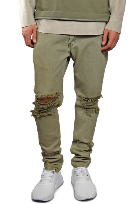 The Bleached Ripped Tapered Denim in Olive