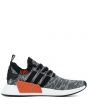 The NMD_R2 PK in Coral Black and White 2