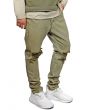 The Bleached Ripped Tapered Denim in Olive 3