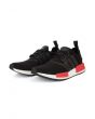 The adidas NMD R1 Sneaker in Black and Red
