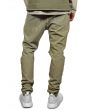 The Bleached Ripped Tapered Denim in Olive 4