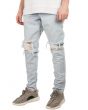 The Ripped Tapered Denim Jeans in Bleached Indigo 1