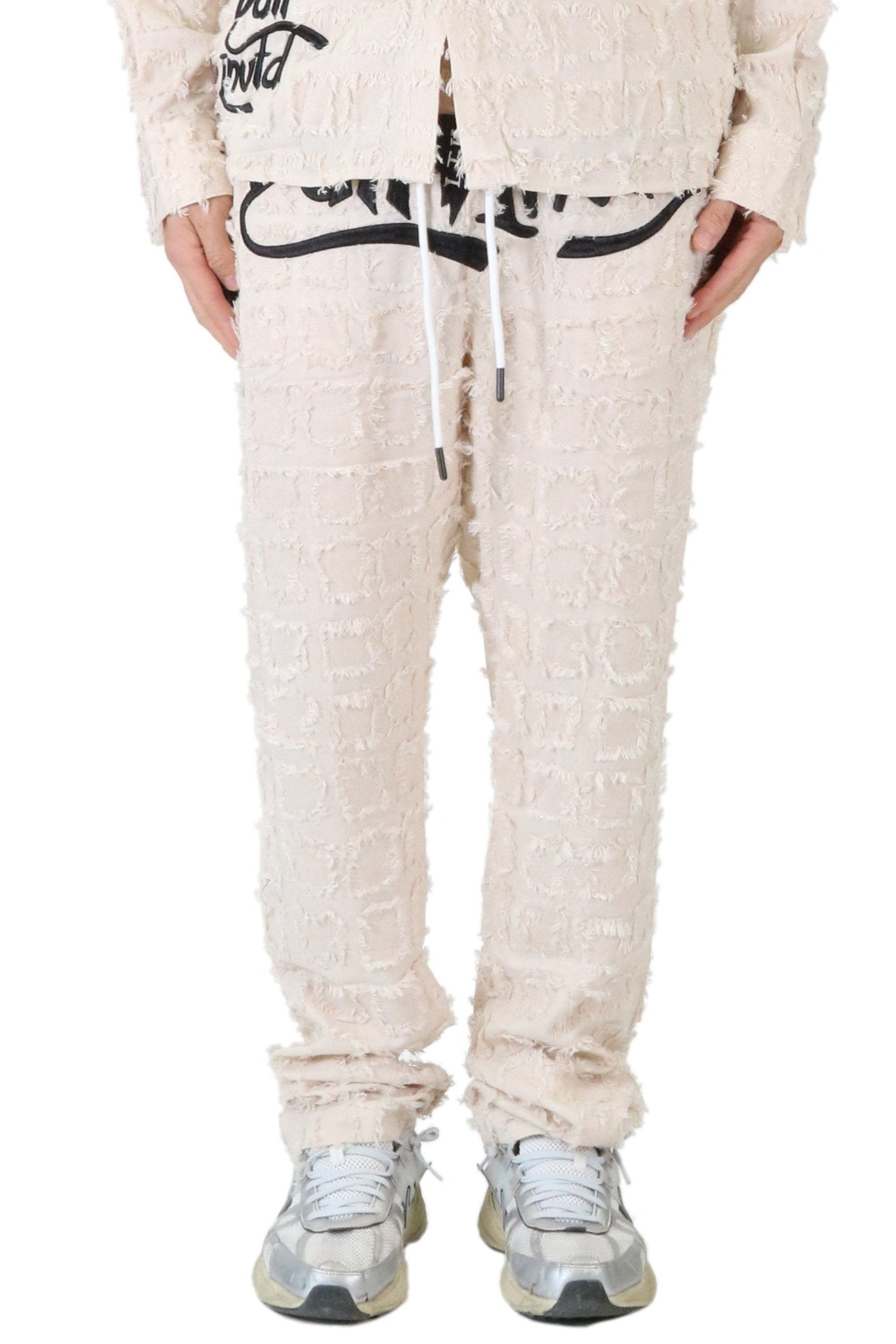 Earth Men's ripped & repaired long pants